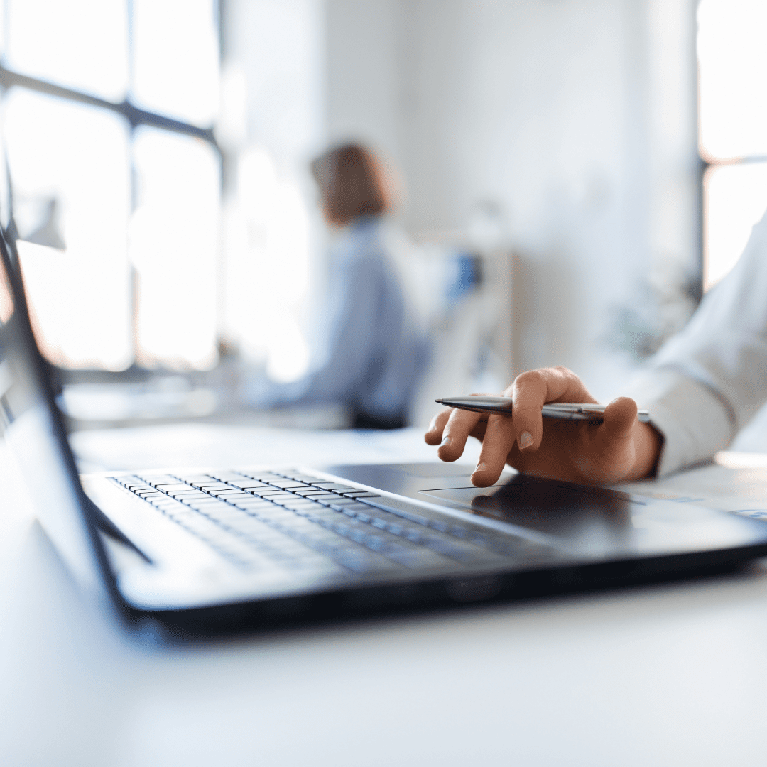 hand on keyboard working on CI/CD pipeline
