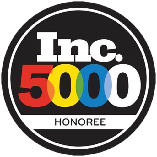 A round black badge with Inc. 5000 in bold text; Inc. in white, 5000 in red, yellow, blue, and white. The word HONOREE appears below, also in white, all inside a white-bordered circle.