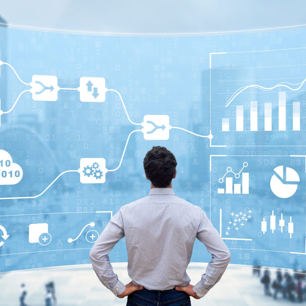 Man looking at blue database screen