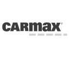 The image shows the CarMax logo, with the word CARmax in bold black letters and five gray dashes underneath the max portion.
