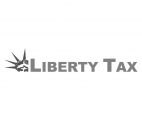 Logo for Liberty Tax in gray. The word Liberty appears in bold letters, and the L is designed with the left side of the Statue of Liberty’s crown and face. The word TAX is written to the right in uppercase letters.